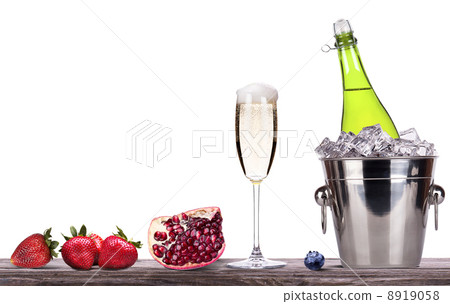 summer fruits and ice bucket  with champagne 8919058