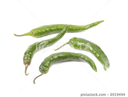 Four green peppers. 8919494