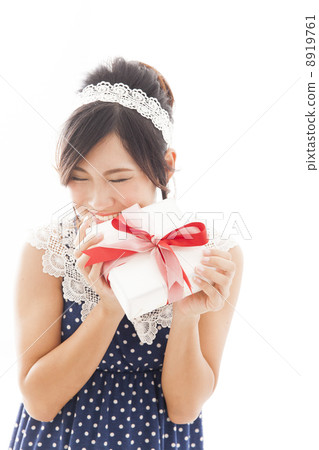 A woman with a present 8919761