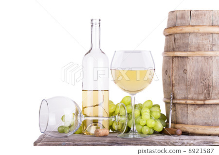 grapes on a barrel with corkscrew and wine glass grapes on a barrel with corkscrew and wine glass 8921587
