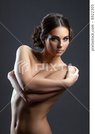Portrait of hot brunette posing topless in studio Portrait of hot brunette posing topless in studio 8922305