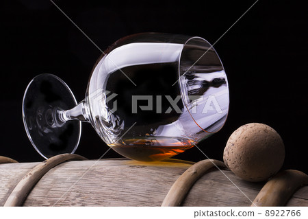 Cognac or brandy on a wooden barrel 8922766