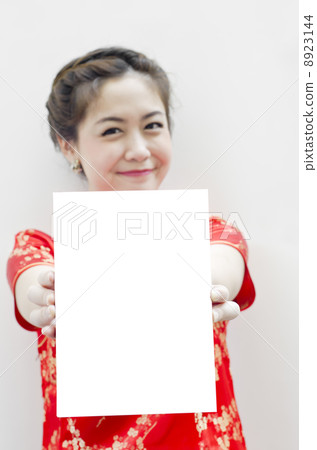 smiling beautiful chinese woman with tradition clothing with cop 8923144