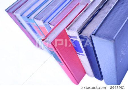 Row of books lined up in row 8948981