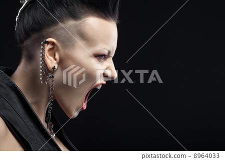 angry young woman screaming isolated on black background with co 8964033