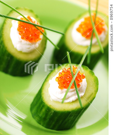 Appetizers with red caviar 8969754