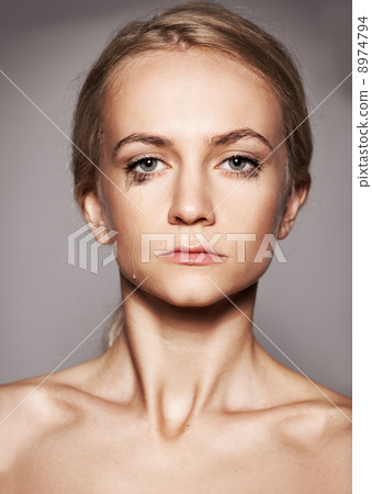 Sad woman with tears in her eyes Sad woman with tears in her eyes 8974794
