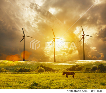wind turbine at colorful sunset 8981683