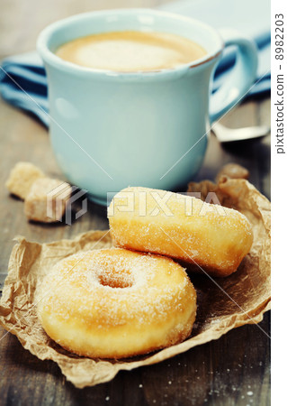 coffe and fresh donuts 8982203