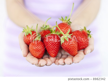 Girl with fresh strawberries 8982342