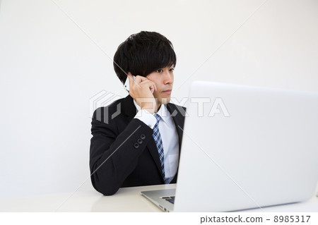 Working businessman Working businessman 8985317