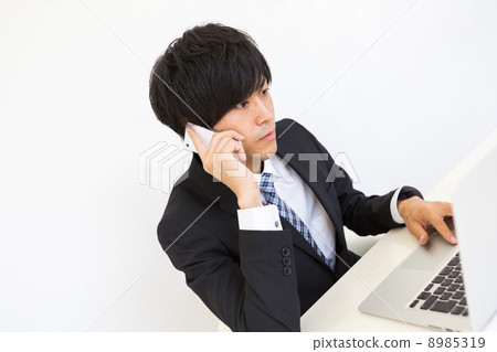 Working businessman Working businessman 8985319