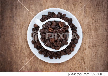 coffee beans in a cup coffee beans in a cup 8986033