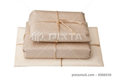 pile parcel wrapped with brown kraft paper pile parcel wrapped with brown kraft paper 8986036