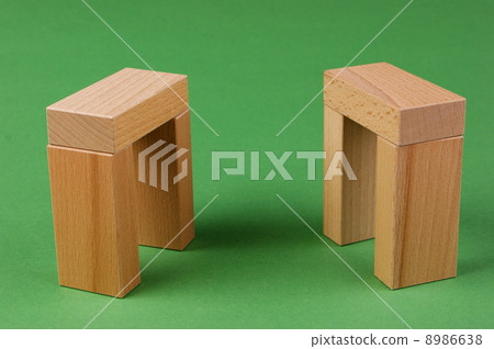 wooden geometric shapes on a green background wooden geometric shapes on a green background 8986638