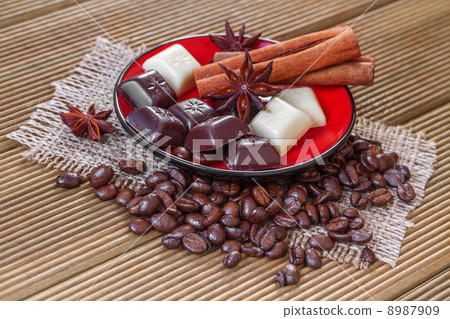 White and dark chocolate on a wooden background 8987909