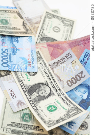 Dollars and Rupiah overseas bills 8988786