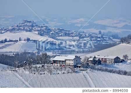 Snowy hills of Piedmont, Italy. 8994030