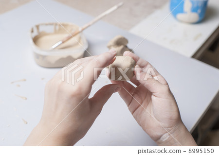 Girl make toyfrom clay Girl make toyfrom clay 8995150