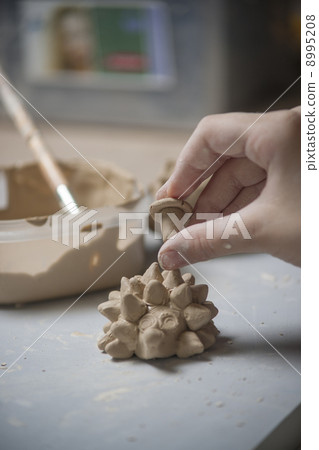 Girl make toyfrom clay Girl make toyfrom clay 8995208