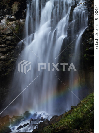I saw a bridge of a superb view of the rainbow at the Ashiribetsu waterfall I saw a bridge of a superb view of the rainbow at the Ashiribetsu waterfall 9008424