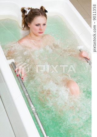 girl in a bathtub girl in a bathtub 9011358
