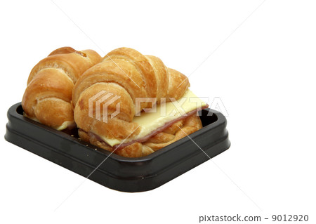 two Ham Cheese croissant in brown tray two Ham Cheese croissant in brown tray 9012920