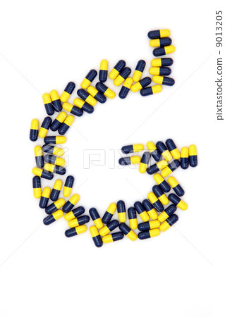 The letter G alphabet made of medical capsules 9013205