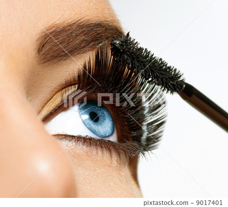 Mascara Applying. Long Lashes closeup 9017401