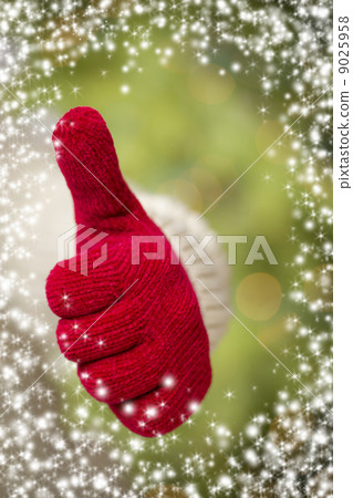Woman Wearing Red Mittens Holding Out Thumbs Up Hand Sign 9025958