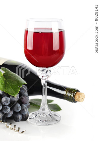 wineglass with red grape wine 9029143