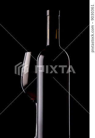 Glass and bottle of red wine 9030361