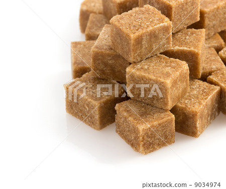 brown sugar cubes on white 9034974