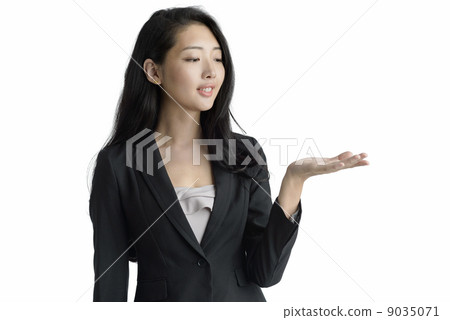 Young business woman presenting studio white background Young business woman presenting studio white background 9035071