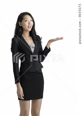 Young business woman presenting studio white background Young business woman presenting studio white background 9035073