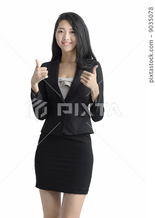 Young business woman thumbs up studio white background Young business woman thumbs up studio white background 9035078