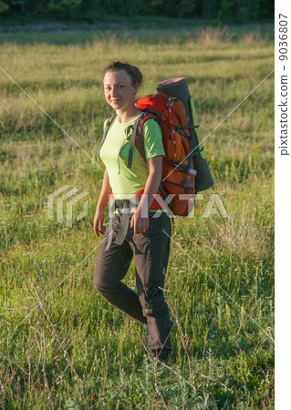 Happy smiling woman in field Happy smiling woman in field 9036807