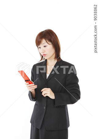 Business woman using Garakae Business woman using Garakae 9038862