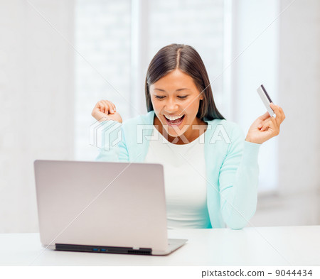 businesswoman with laptop and credit card 9044434