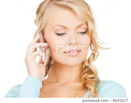 businesswoman with cell phone calling 9045017