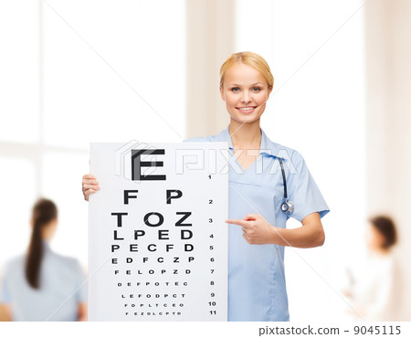 smiling female doctor or nurse with eye chart 9045115
