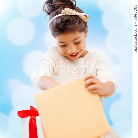 happy child girl with gift box 9045200