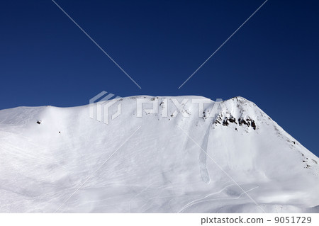 Off-piste slope with trace of skis, snowboarding and avalanche Off-piste slope with trace of skis, snowboarding and avalanche 9051729