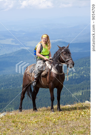 rider on horseback at mountains 9054709