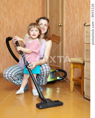 Family chores with vacuum cleaner Family chores with vacuum cleaner 9055126