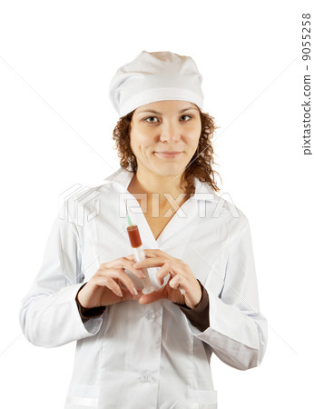 Portrait of nurse with syringe Portrait of nurse with syringe 9055258