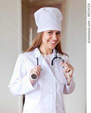 friendly doctor in clinic interior 9055419
