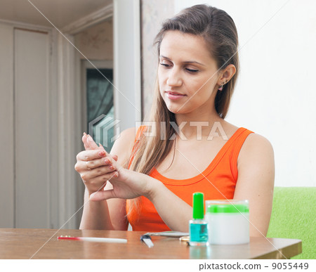 beauty woman looks to nails beauty woman looks to nails 9055449