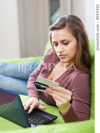 woman doing shopping in internet woman doing shopping in internet 9055493