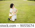 Horn player image (playing, blowing, lawn) 9055674